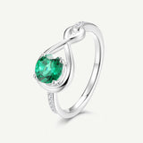 Infinite Embrace Promise Ring In Emerald