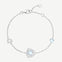 Trinity textured silver bracelet with created aquamarine triangle accents