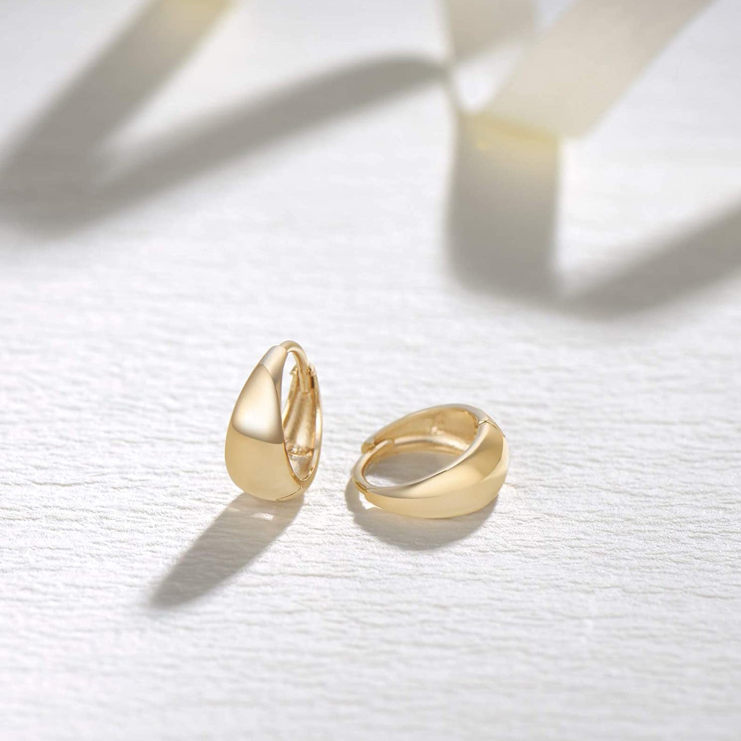 Huggie hoop earrings in 14k gold for girls